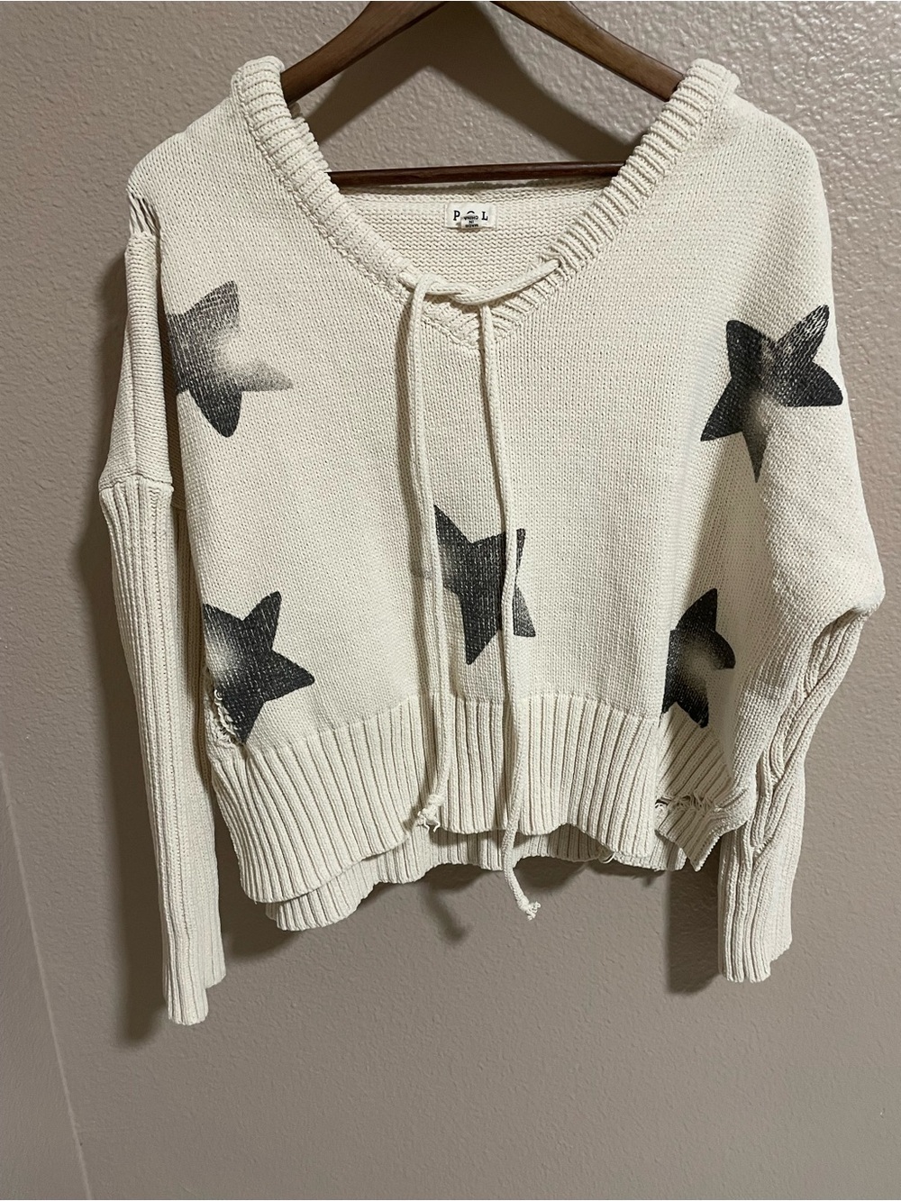 POL Cream V-Neck Star Knit Sweater with Black Stars Distressed with Hoodie